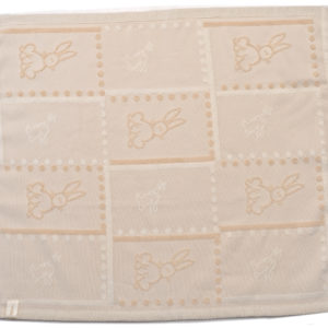 Coperta con disegno in rilievo
